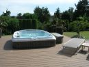 Un Spa Jacuzzi® Semi-Encastré Dans Une Terrasse En Bois #spa ... concernant Jacuzzi Pour Jardin